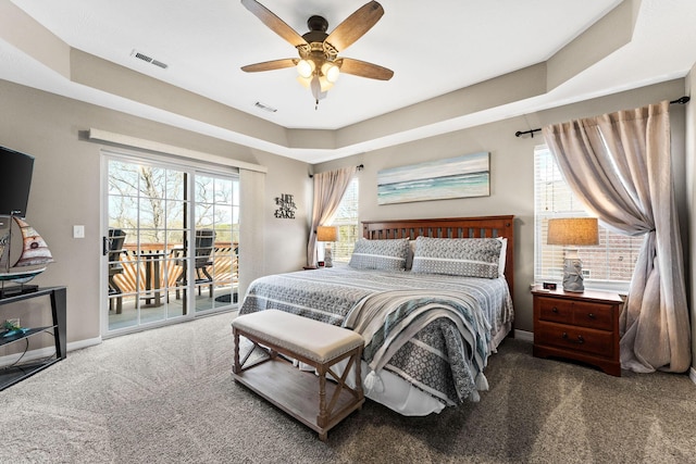280 Tina St Unit 9, Hollister, MO 65672 - carpeted bedroom with baseboards, access to outside, and visible vents
