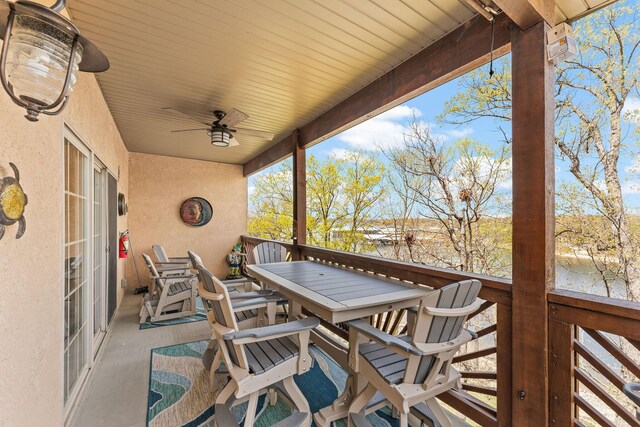 280 Tina St Unit 9, Hollister, MO 65672 - exterior space with outdoor dining area and ceiling fan