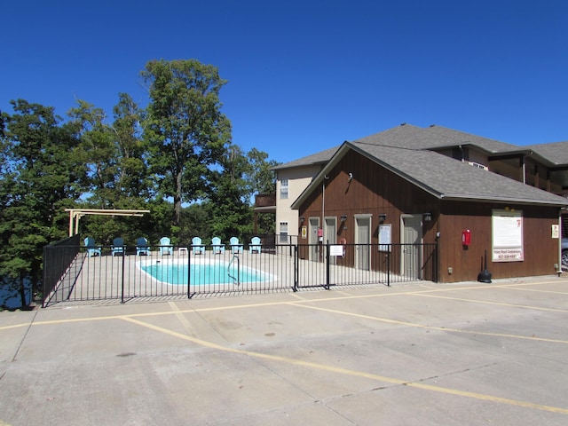 280 Tina St Unit 9, Hollister, MO 65672 - community pool with fence and a patio area