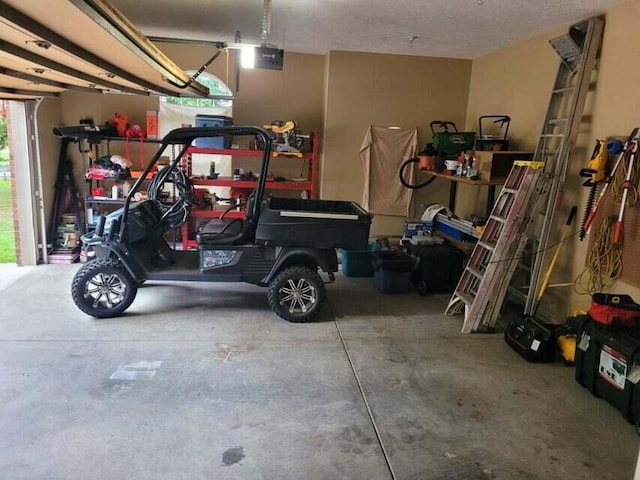 garage featuring a garage door opener