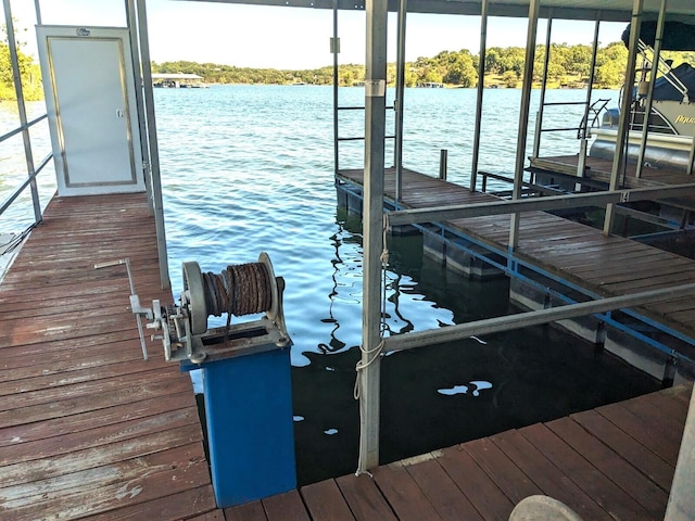 view of dock with a water view