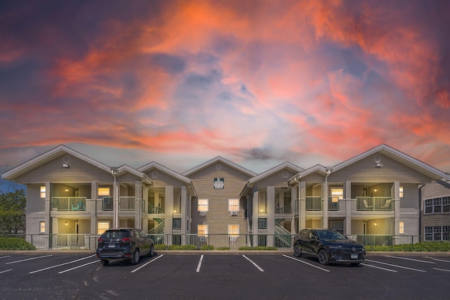 view of outdoor building at dusk