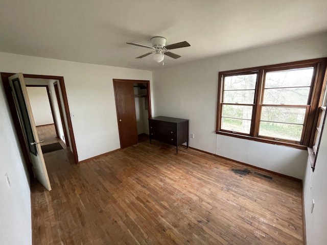 601 Texas St, West Plains, MO 65775 - unfurnished bedroom with visible vents, baseboards, and wood finished floors