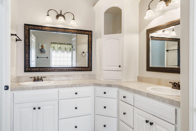 bathroom with double vanity and a sink