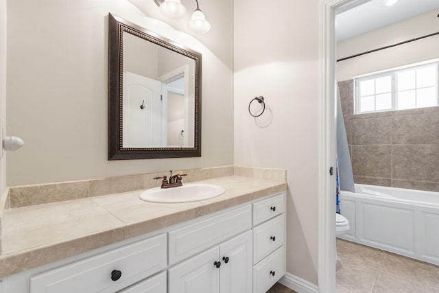 full bathroom featuring shower / bath combination with curtain, vanity, toilet, and tile patterned floors