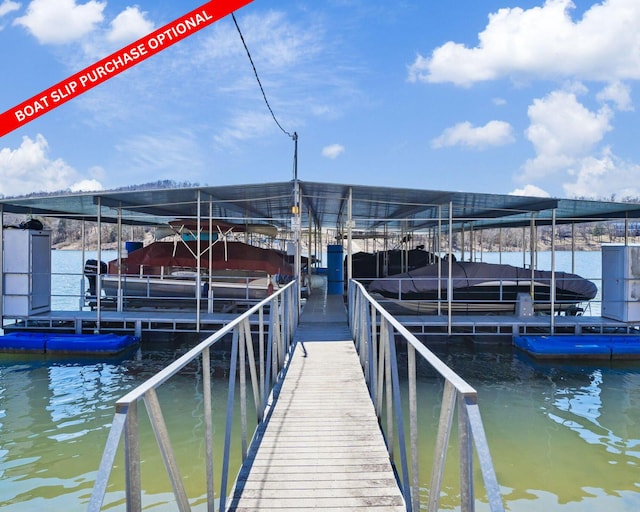 dock area with a water view and boat lift