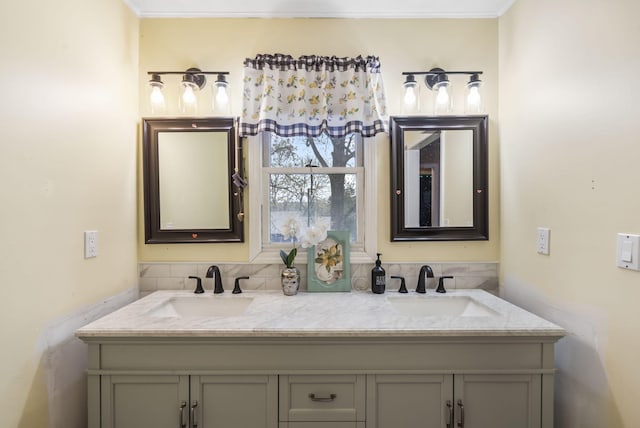 bathroom featuring ornamental molding, vanity, and backsplash