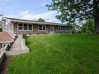 exterior space with a front lawn