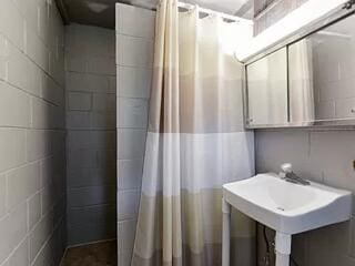 bathroom with a shower with curtain