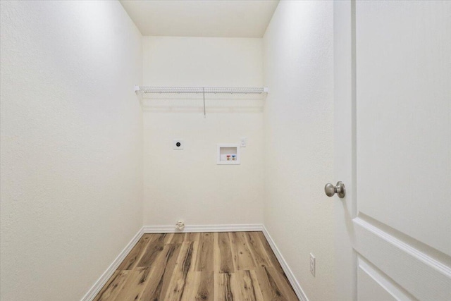 laundry room featuring hardwood / wood-style flooring, hookup for a washing machine, and hookup for an electric dryer