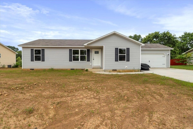 ranch-style house featuring a front yard and a garage