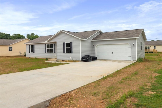 ranch-style house with a front yard and a garage