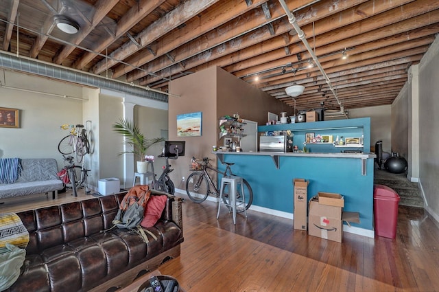 312 S Campbell Ave Unit D, Springfield, MO 65806 - living room with baseboards and hardwood / wood-style floors