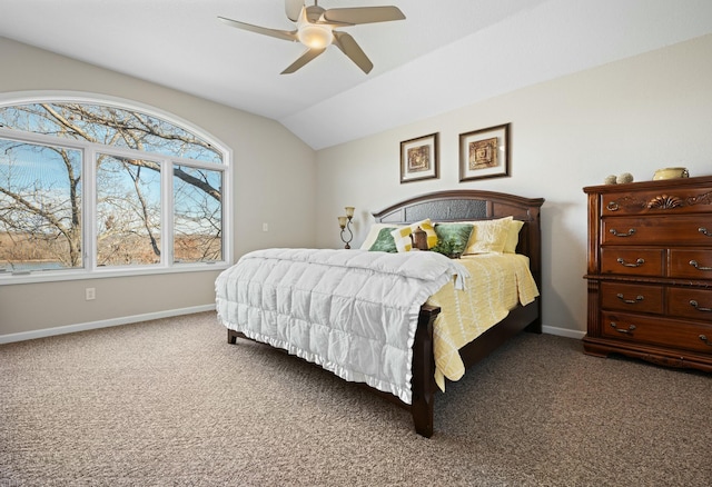 carpeted bedroom with ceiling fan and lofted ceiling