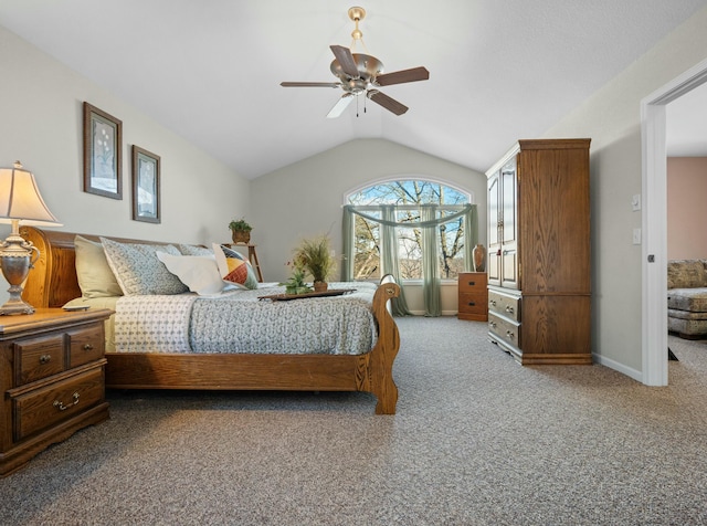 carpeted bedroom featuring lofted ceiling and ceiling fan