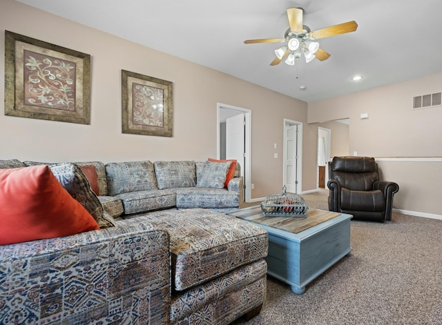 living room with carpet and ceiling fan