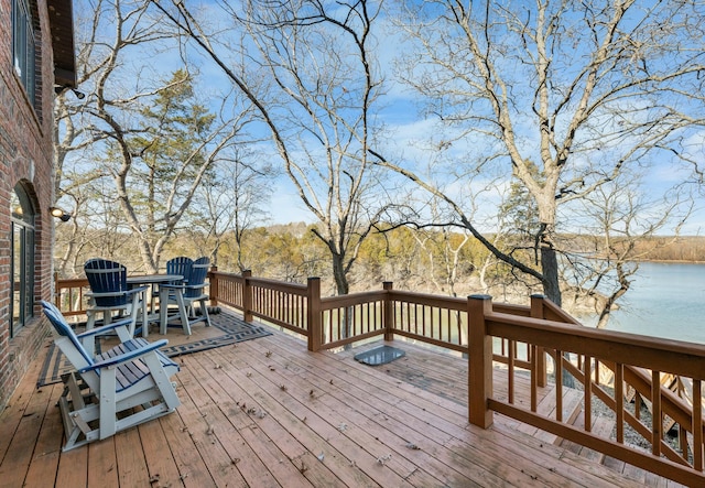 deck featuring a water view