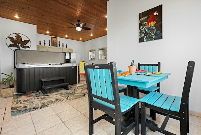 tiled dining space with wooden ceiling and ceiling fan