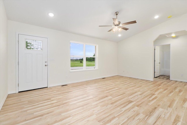 entrance foyer with ceiling fan and light hardwood / wood-style flooring