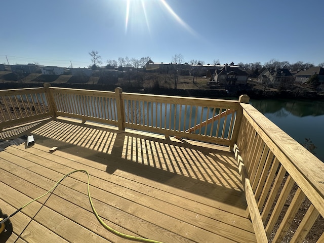 deck featuring a water view