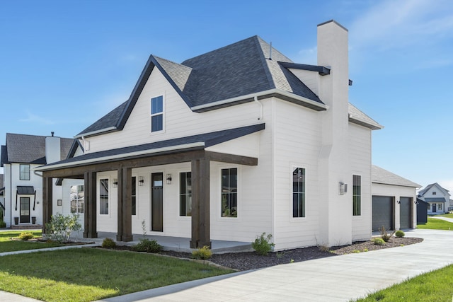 view of front of home with a front lawn and covered porch