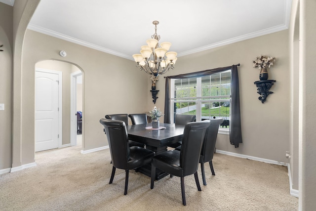 106 Willowbrooke, Branson, MO 65616 - dining room featuring arched walkways, a chandelier, crown molding, and light colored carpet