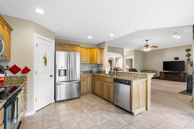 106 Willowbrooke, Branson, MO 65616 - kitchen with stainless steel appliances, a peninsula, light tile patterned flooring, open floor plan, and ceiling fan