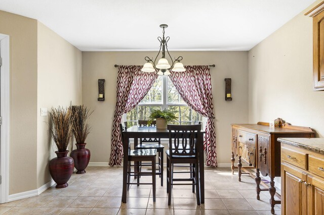 106 Willowbrooke, Branson, MO 65616 - dining room featuring baseboards, a chandelier, and light tile patterned floors
