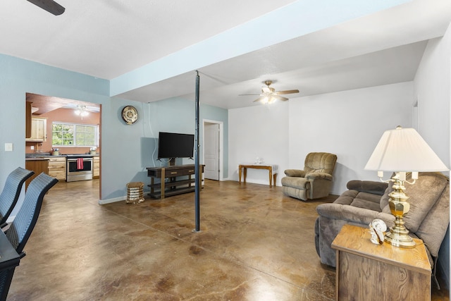 106 Willowbrooke, Branson, MO 65616 - living room with concrete flooring, a ceiling fan, and baseboards