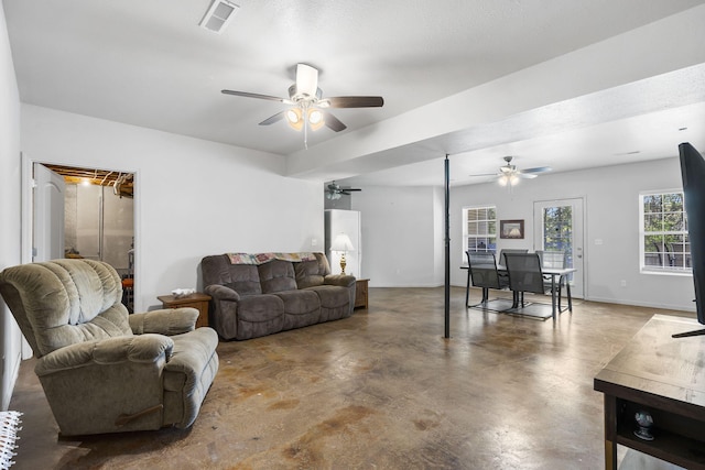 106 Willowbrooke, Branson, MO 65616 - living room featuring a ceiling fan, visible vents, and finished concrete flooring