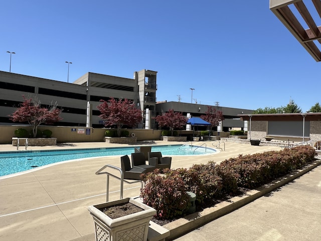 pool with a patio