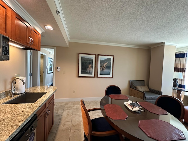 dining space featuring light tile patterned floors, ornamental molding, a textured ceiling, and sink