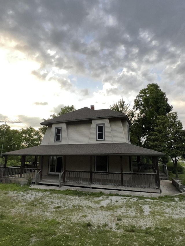 429 S Eagle Ave, Norwood, MO 65717 - farmhouse with covered porch and roof with shingles