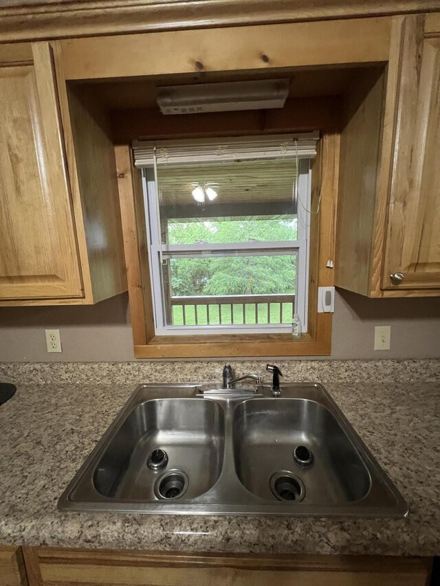 429 S Eagle Ave, Norwood, MO 65717 - interior details featuring light countertops, light brown cabinetry, and a sink
