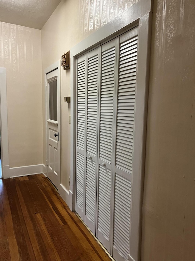 429 S Eagle Ave, Norwood, MO 65717 - hall featuring baseboards and dark wood finished floors