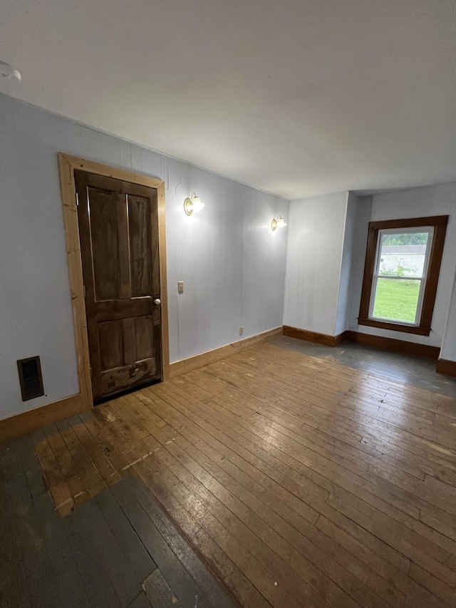 429 S Eagle Ave, Norwood, MO 65717 - empty room featuring baseboards, visible vents, and wood-type flooring