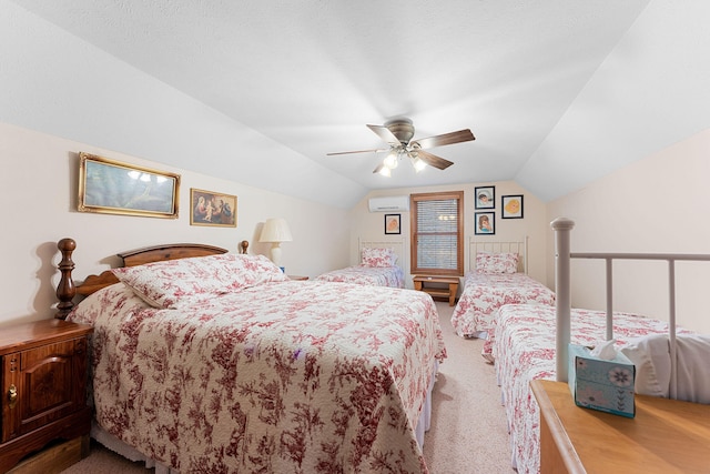 bedroom with ceiling fan, a textured ceiling, carpet floors, vaulted ceiling, and a wall unit AC