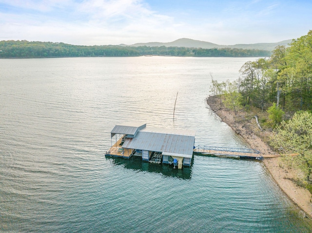 dock area featuring a water and mountain view