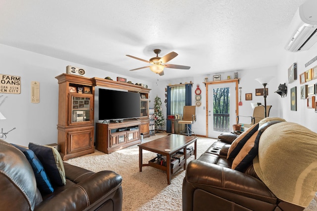 carpeted living room with ceiling fan, an AC wall unit, and a textured ceiling