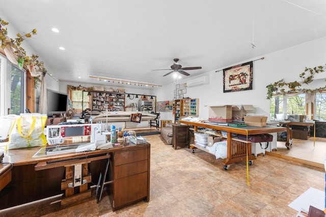 office space with ceiling fan and an AC wall unit