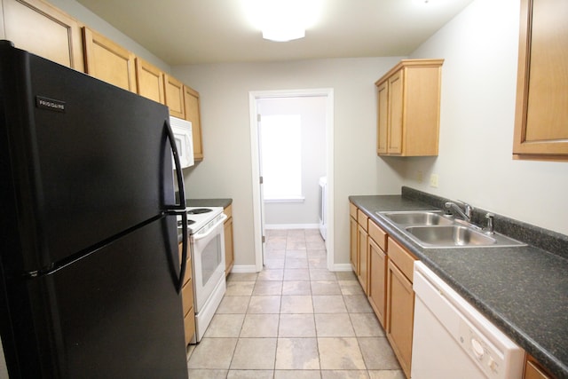 kitchen with light brown cabinetry, white appliances, sink, and light tile patterned floors