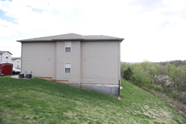 view of property exterior featuring a yard