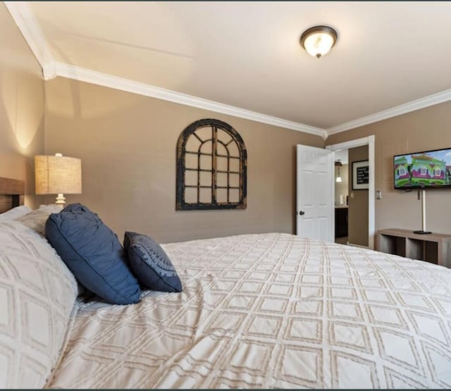 bedroom featuring ornamental molding