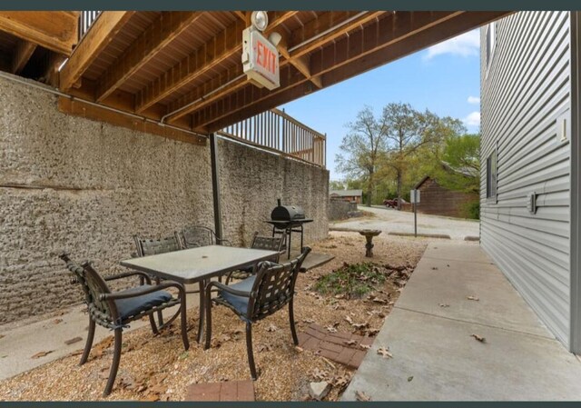 view of patio / terrace with grilling area and outdoor dining space