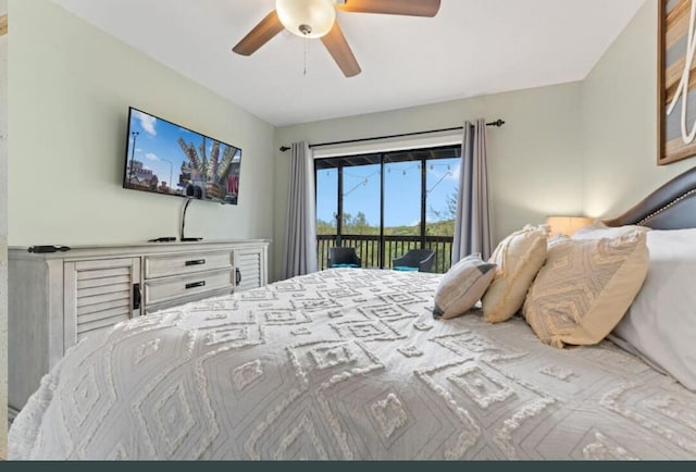bedroom featuring access to exterior and a ceiling fan