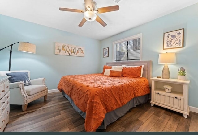 bedroom with wood finished floors, baseboards, and ceiling fan