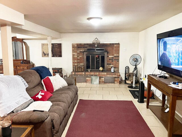 tiled living room with a brick fireplace