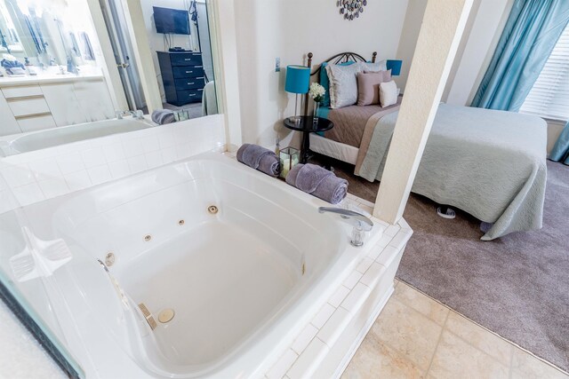 813 Holiday Rdg Unit 6, Branson, MO 65616 - full bathroom with a tub with jets and ensuite bathroom