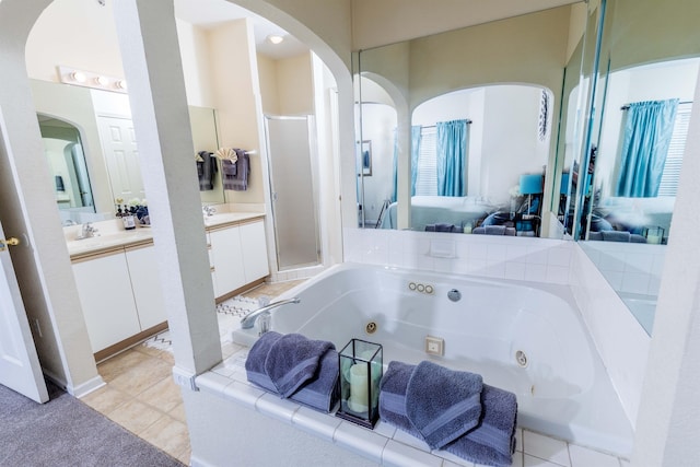 813 Holiday Rdg Unit 6, Branson, MO 65616 - bathroom with a shower stall, vanity, and a tub with jets