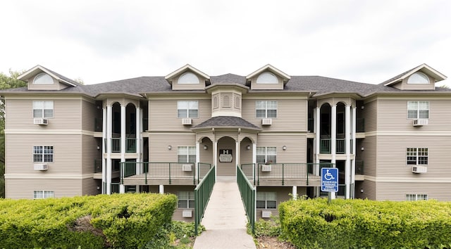 view of front of house featuring cooling unit